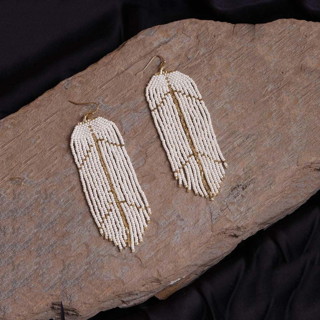 Gilded White Fall Dangler Earrings