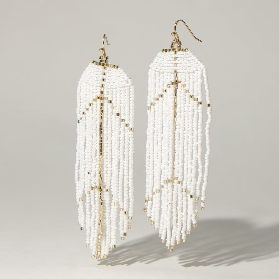 Gilded White Fall Dangler Earrings