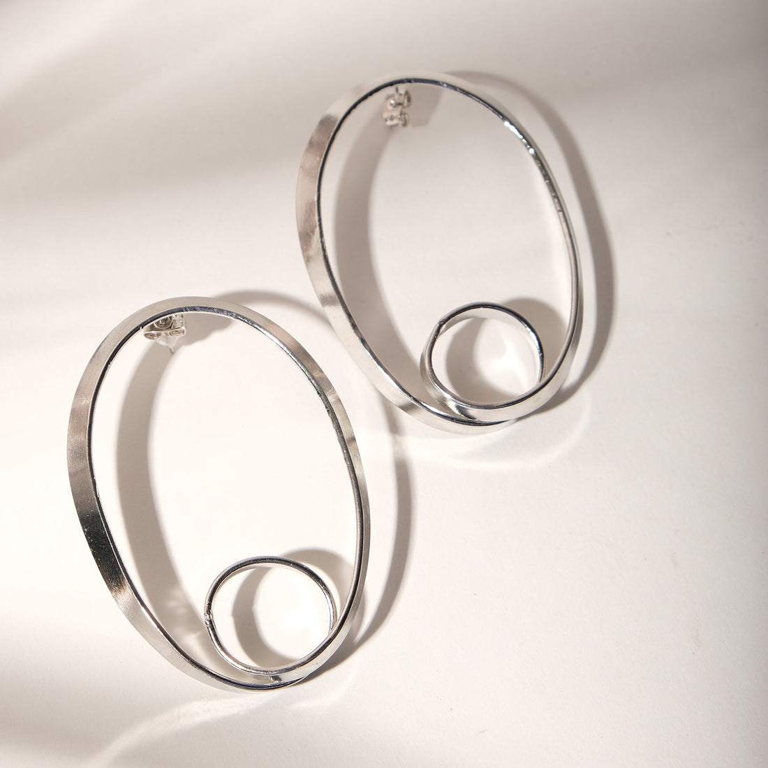 Grand Oval Twisted Silver Hoop Earrings