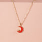 Red Moon Pendant with Gold Chain