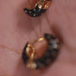 Enameled Black and Gold Huggies Earrings